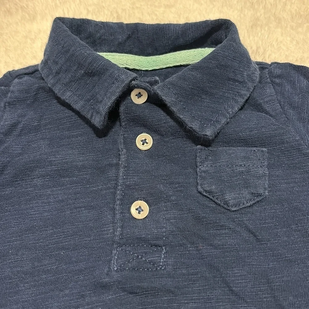 Carters navy blue polo shirt with 3 buttons. 3 months. Short sleeve